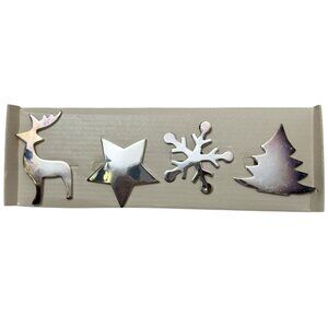 PIER 1 IMPORTS Christmas Napkin Rings Set of 4 Silverplate Holiday Motifs